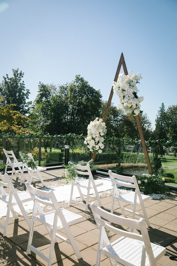 Bridal flowers at wedding reception by La Rose Fleur.