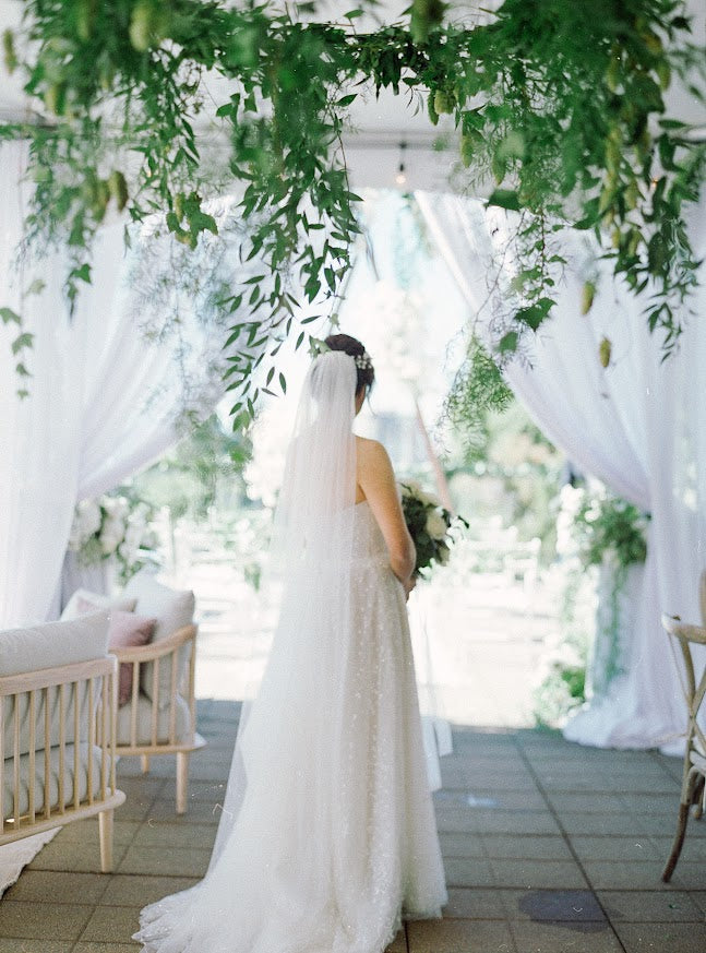 Girl with La Rose Fleur bridal bouquet on wedding day